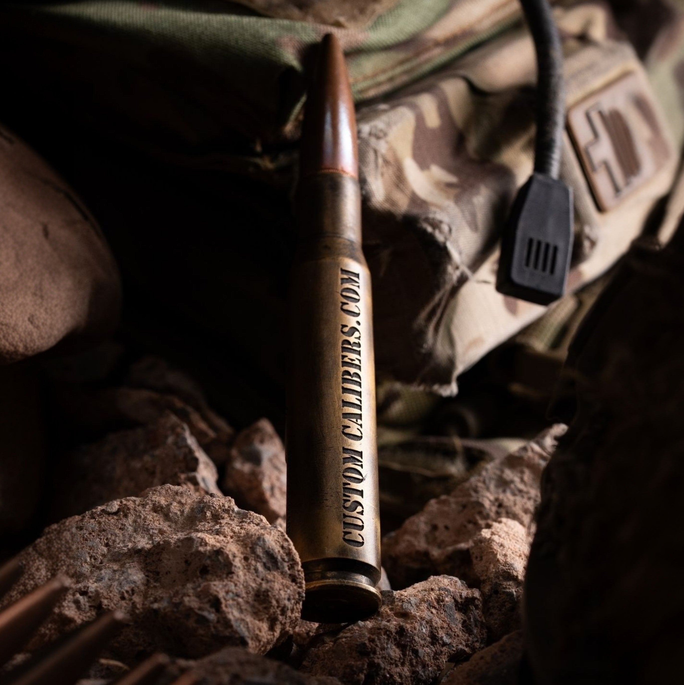 Battle-scarred Brass Genuine .50 Caliber Bullet bottle opener