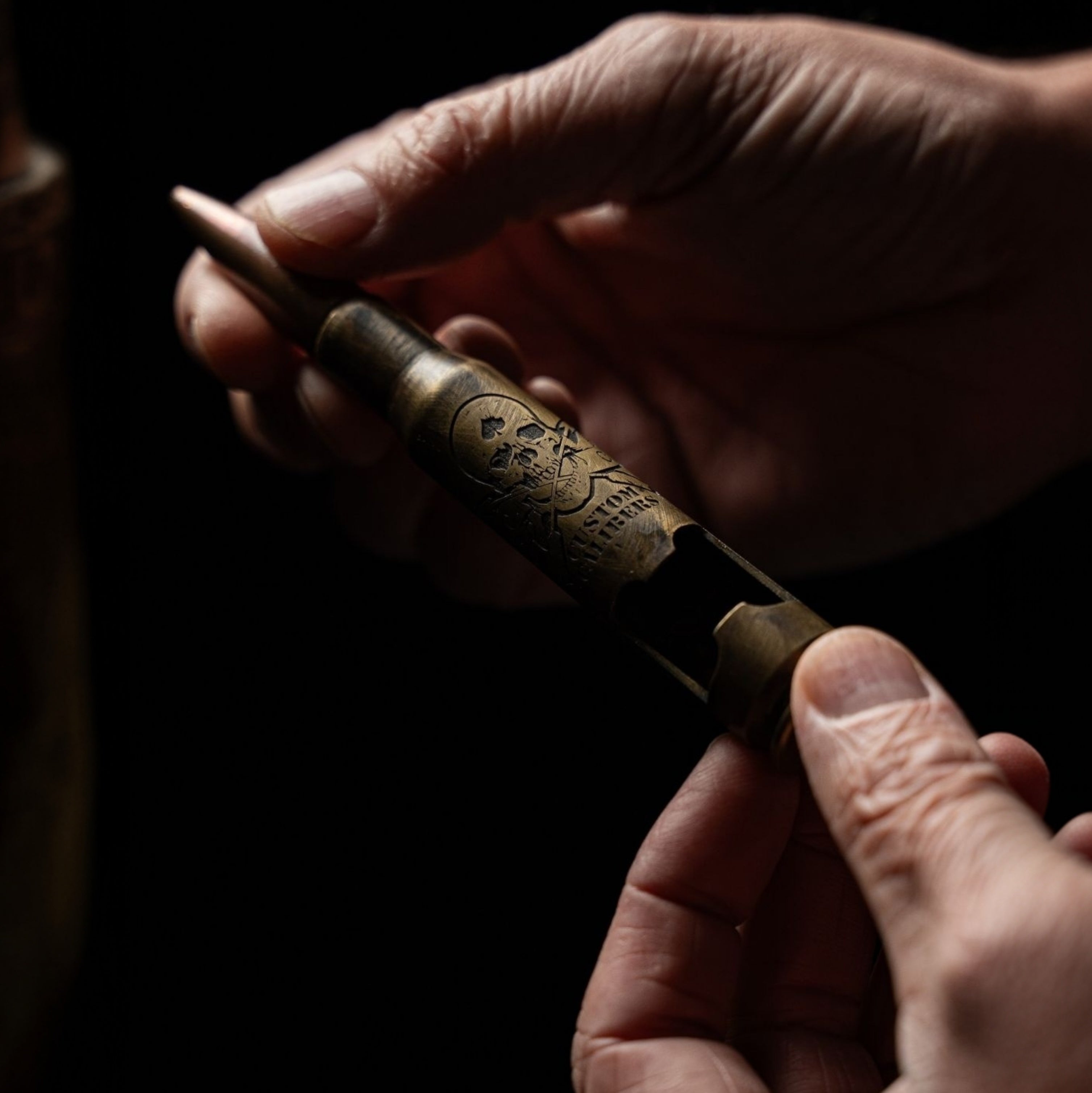 Battle-scarred Brass Genuine .50 Caliber Bullet bottle opener