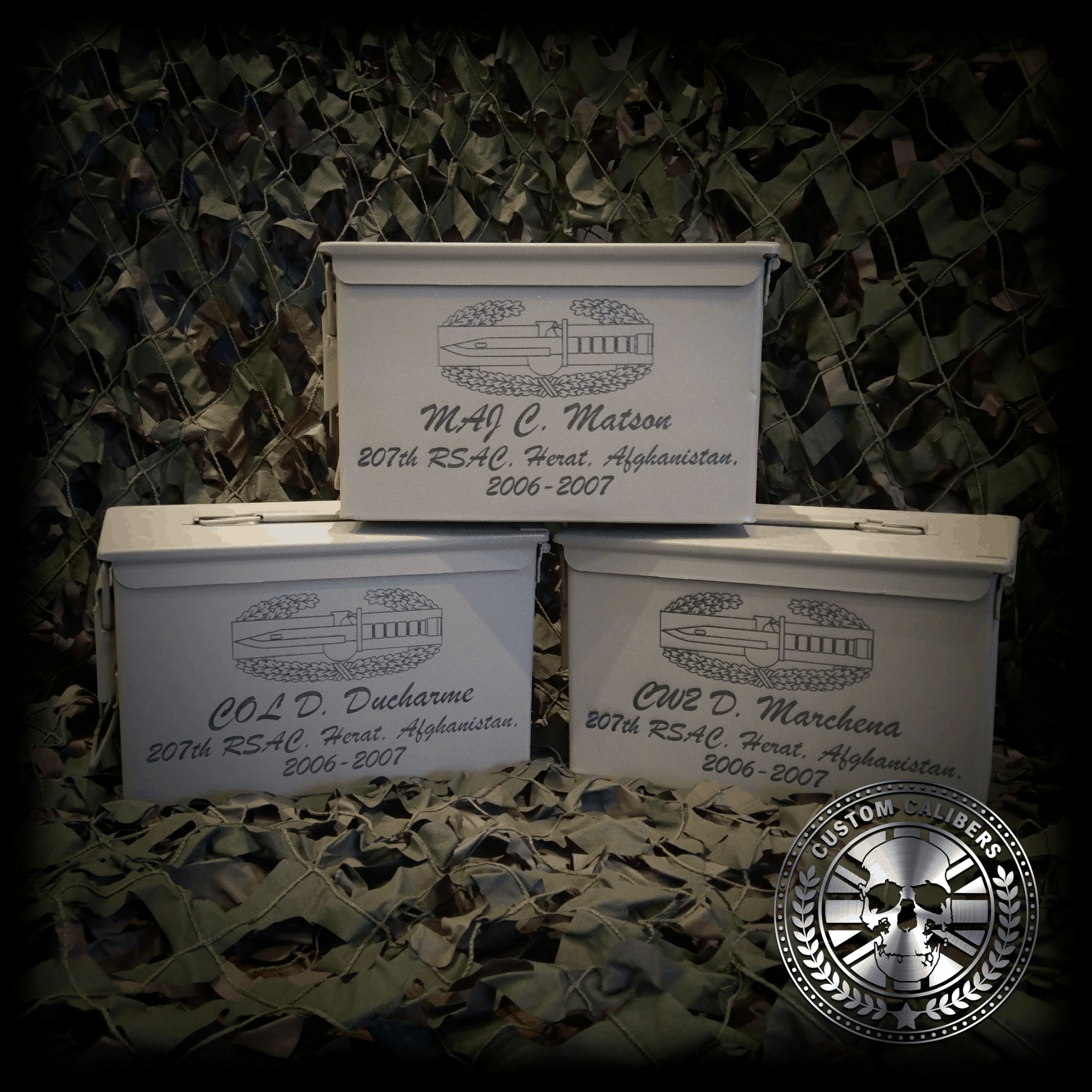 Yet another picture of three cases with engravings on them and the custom calibers logo at the bottom right