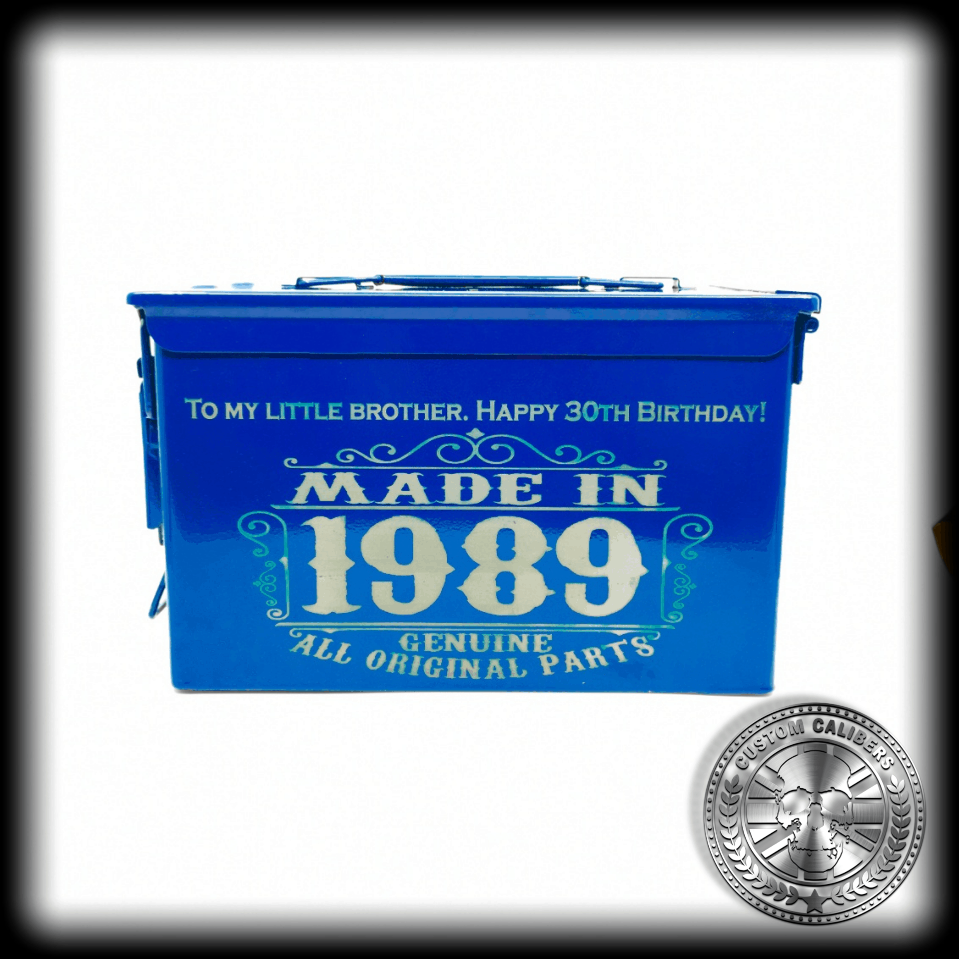 afrontshotofapowdercoatedammotinboxinanairforcebluecolour.ithasbeenengravedwithacustomdesignsaying"madein"