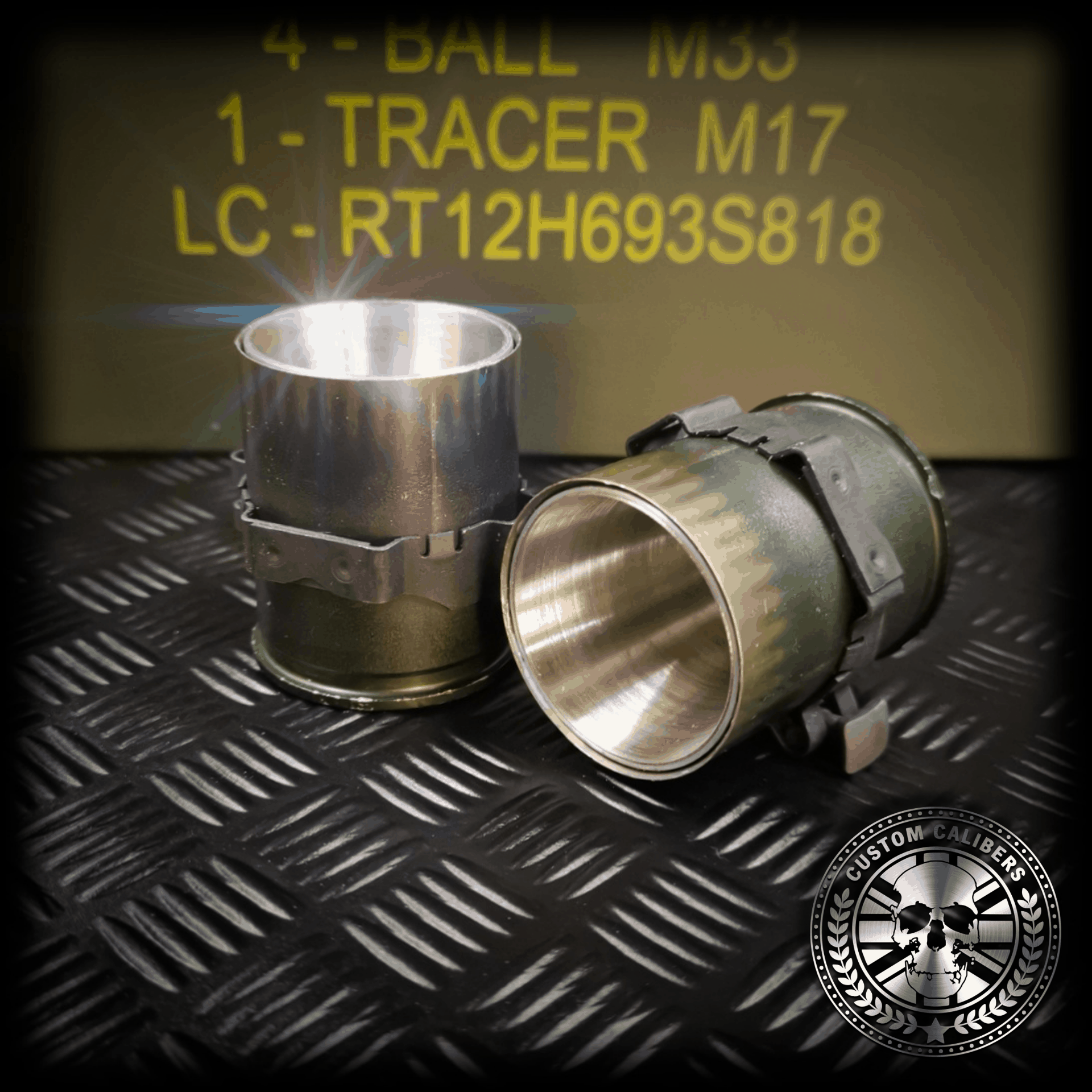 A birds eye view looking into a grenade shot glass showing the stainless steel inners of the upcycled drinking shot glass