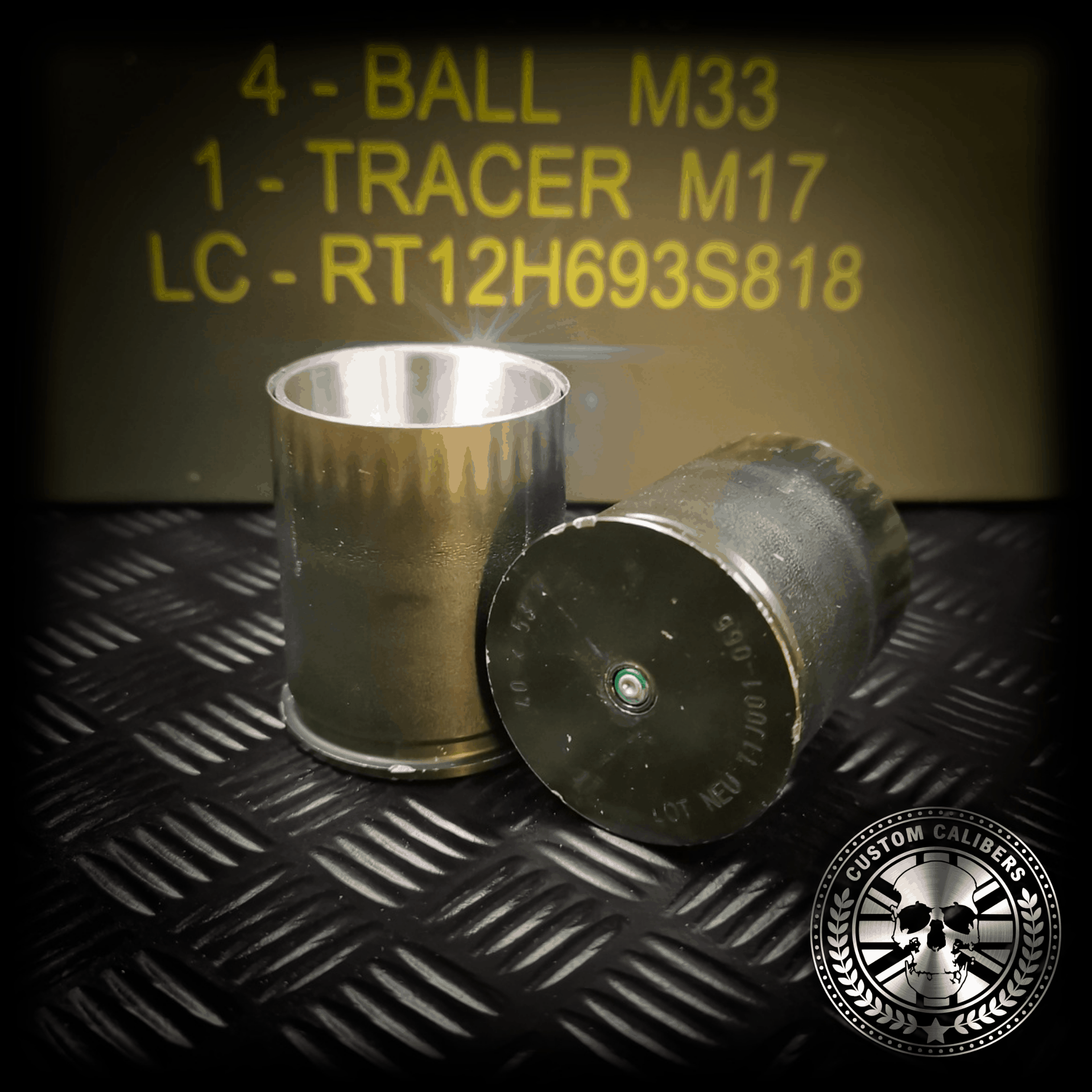 Asideviewlookingatthebottomofthegrenadecasingshowingtheprimeroftheupcycledmmgrenadeshotglass