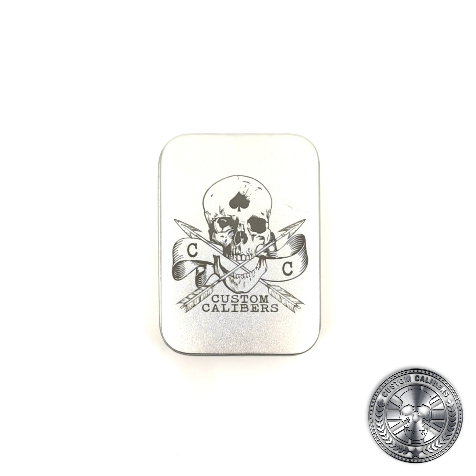 a tin lighter gift box engraved with the custom calibers logo