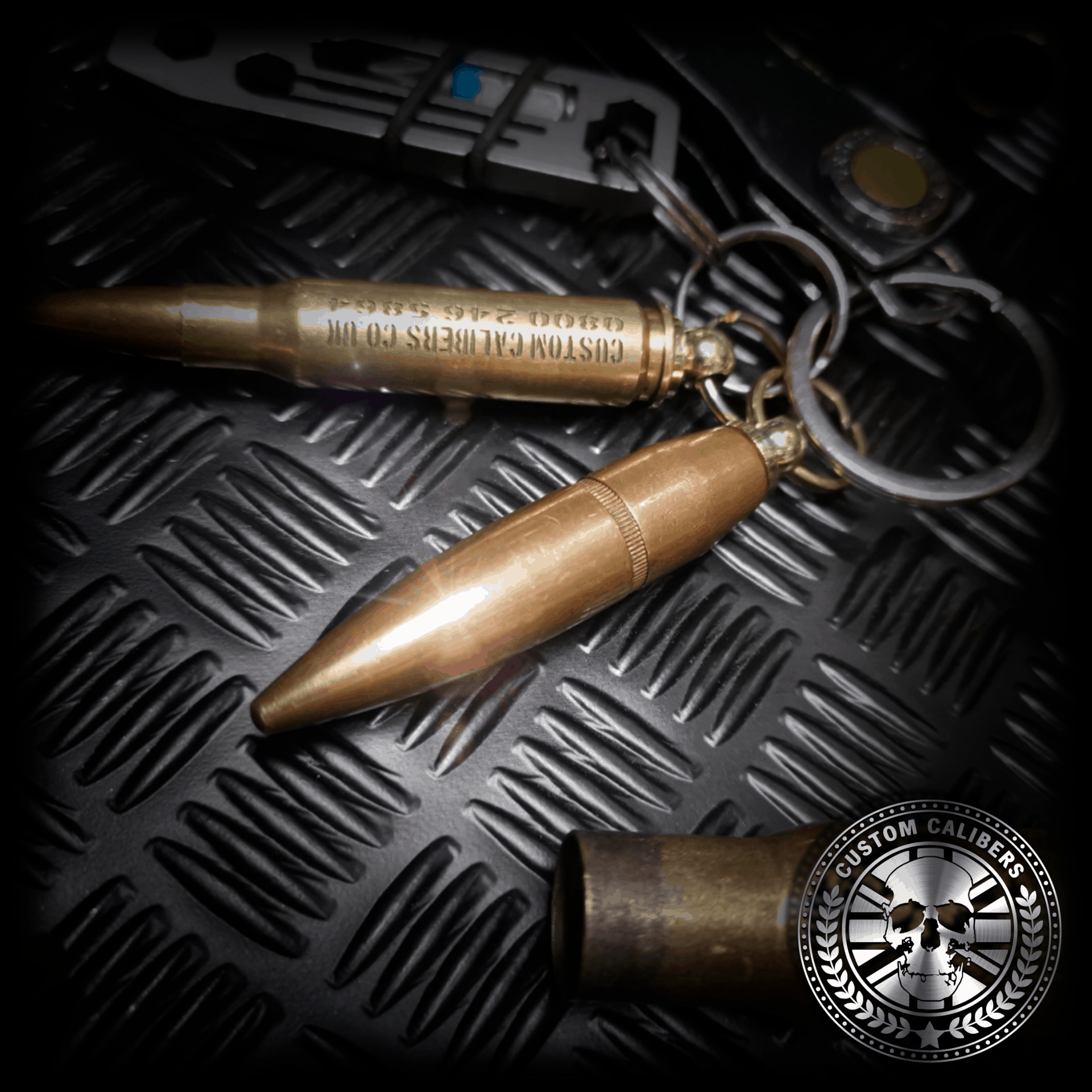 Anicecloseupofacalbulletheadkeyringattachedtoasetofkeys