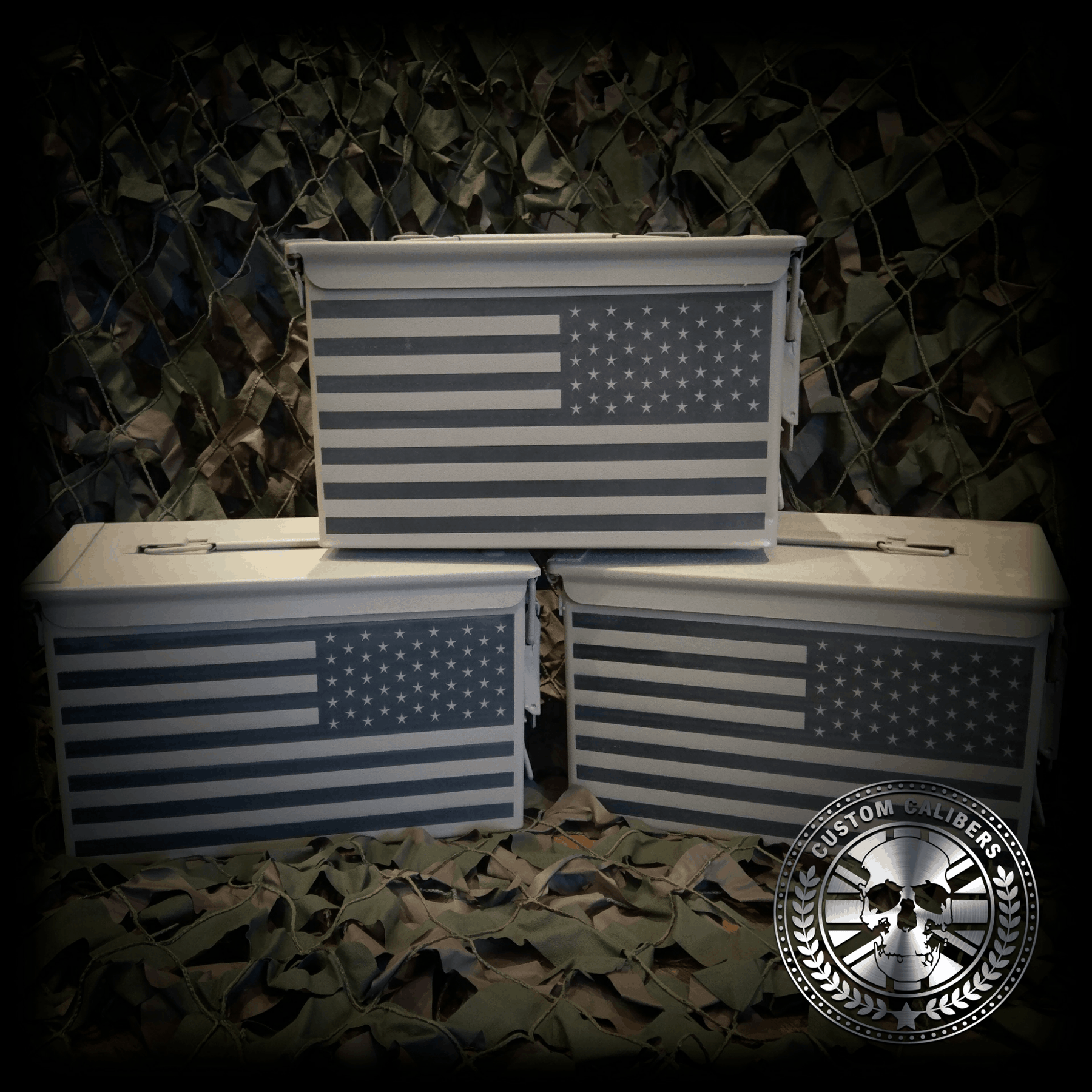 Another incredible image of three cases with american flag on them and the custom calibers logo at the bottom right