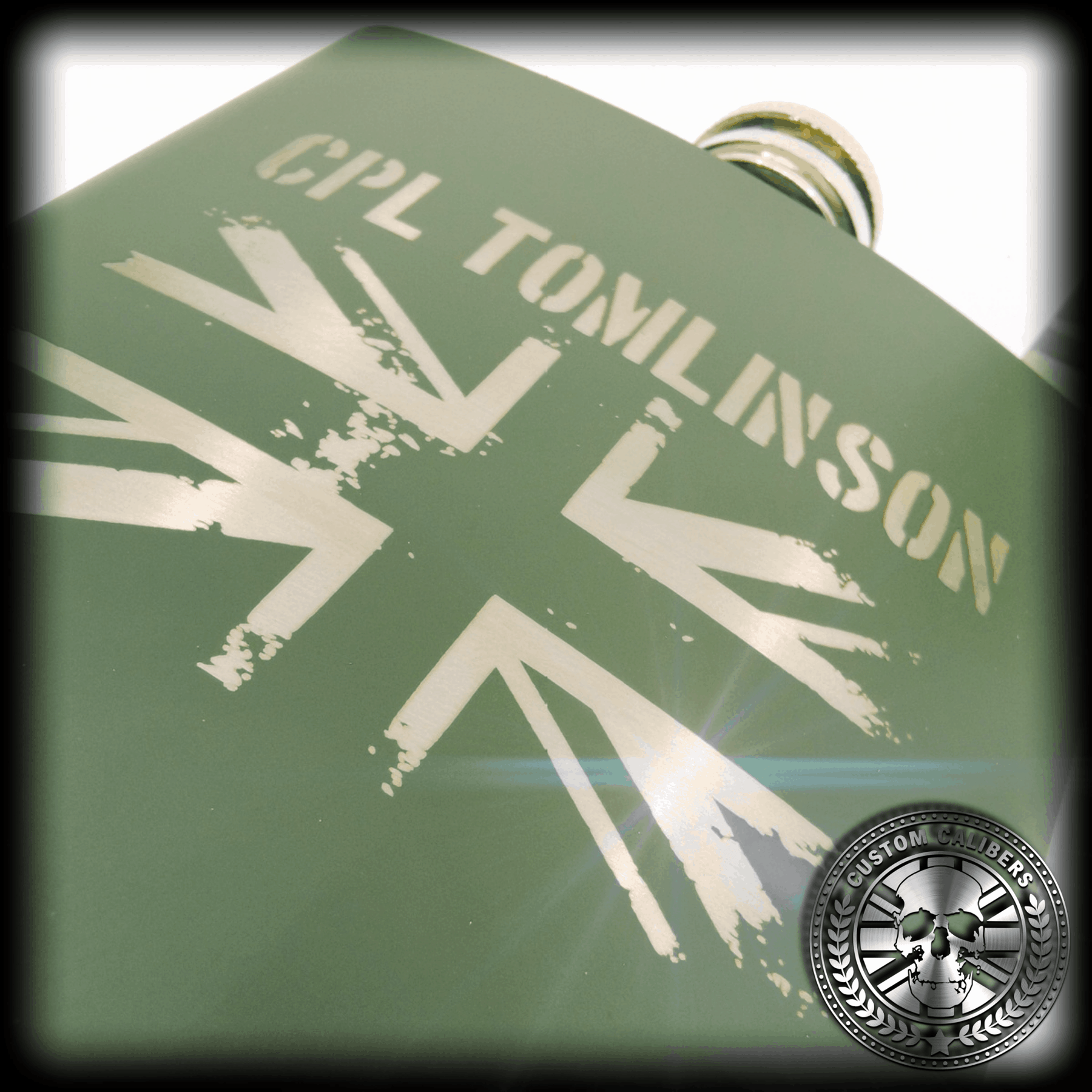 Another macro shot of a NATO green hipflask engraved with a union jack design