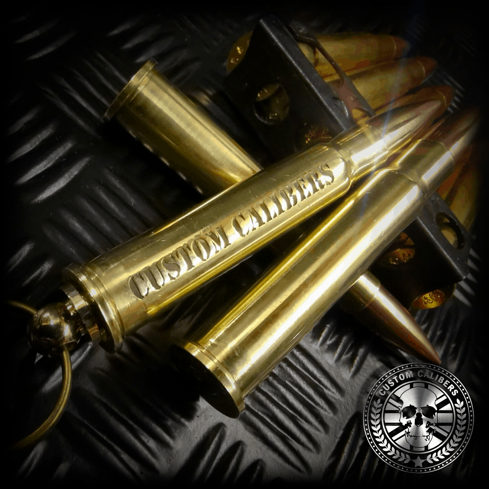 asupershotofoneofour.bulletkeyringsengravedwithcustomcalibers