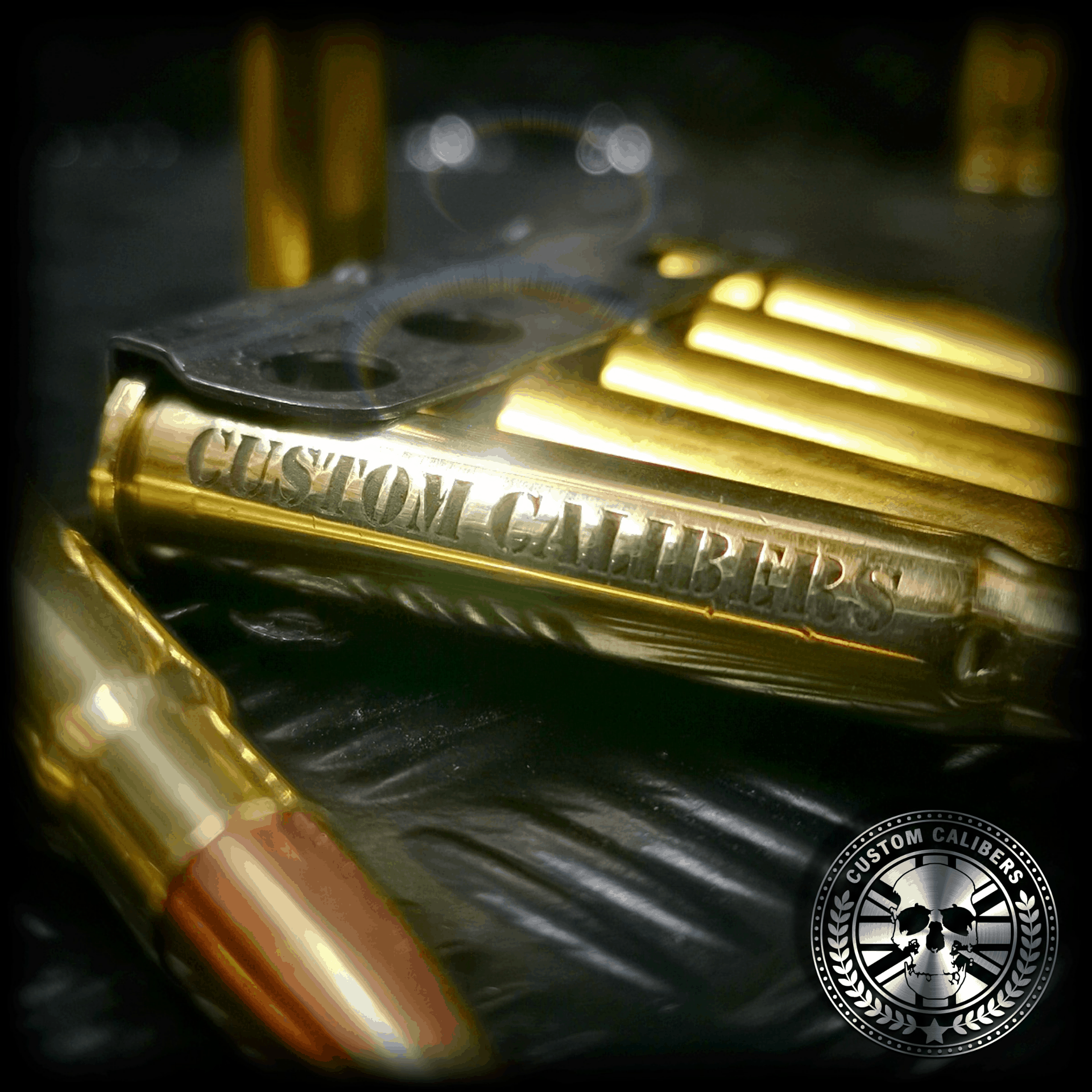 acloseupphotoofour.bulletkeyringsengravedwithcustomcalibers