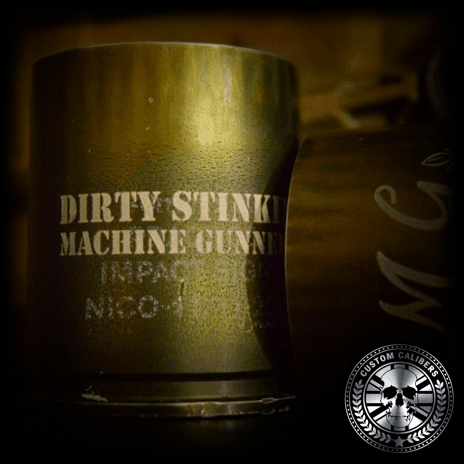 a nice macro shot of one of our battle worn green 40mm GMG grenade shotglasses