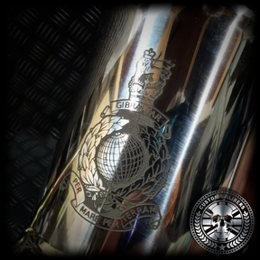 a macro shot of an engraved steel tankard with royal marines crest