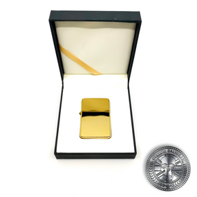 another photo of a highly polished premium solid brass flip top oil lighter inside a luxury gift box