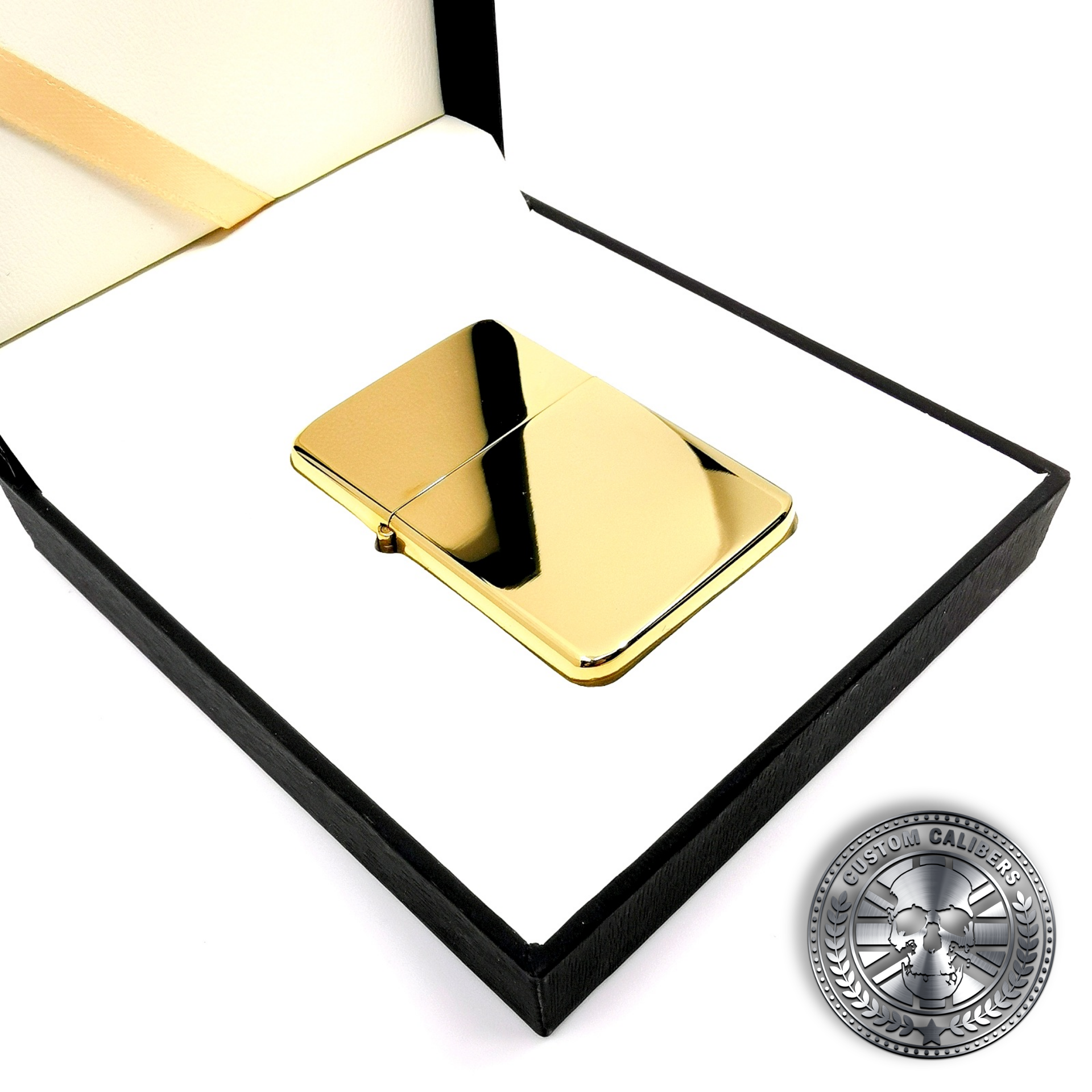 a highly polished premium solid brass flip top oil lighter inside a luxury gift box