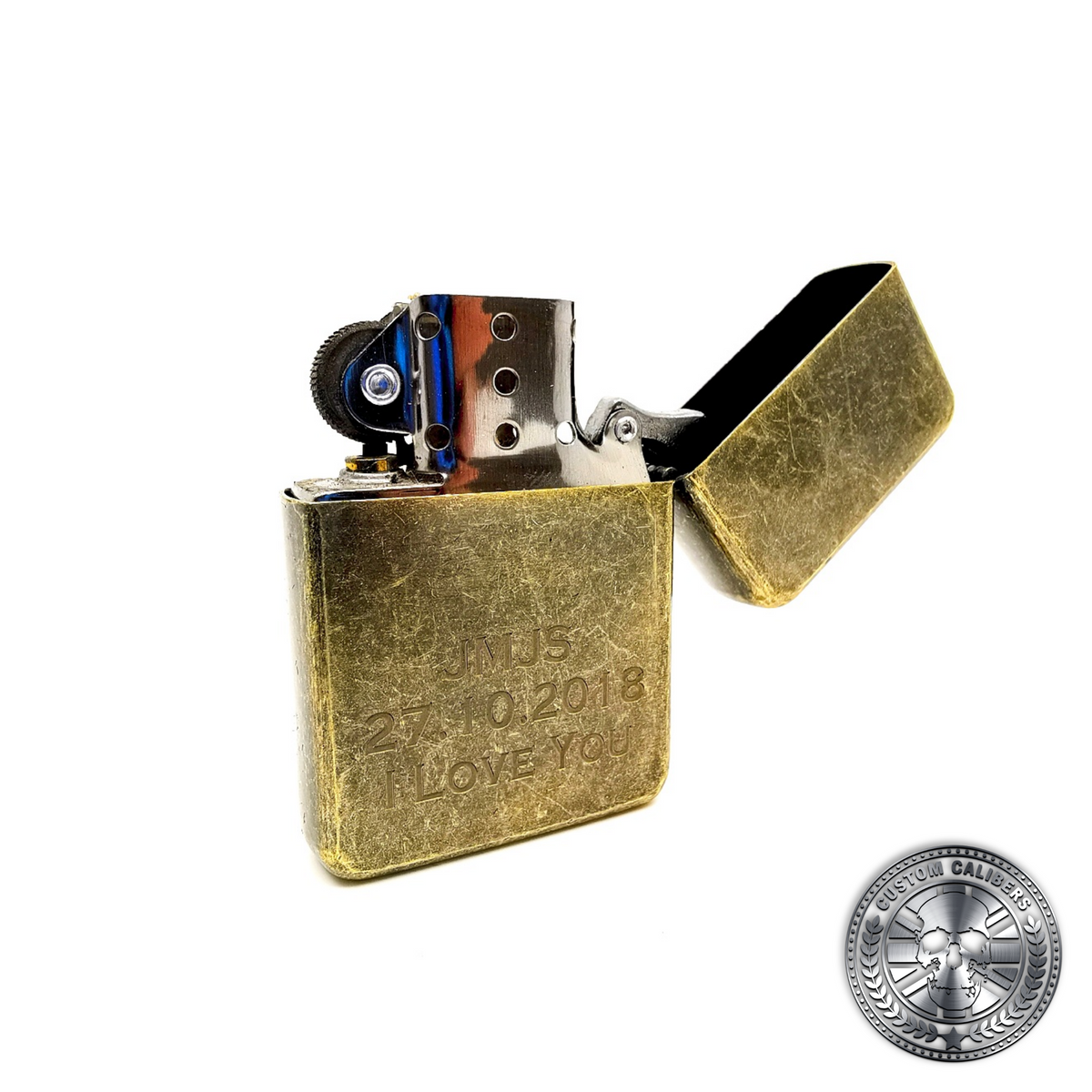 a photo of an antique brass effect flip top oil lighter