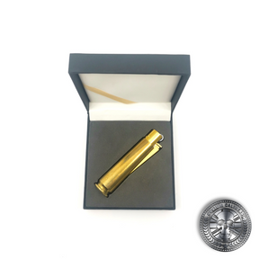 a photo of a real .50 caliber bullet lighter lighter in a luxury gift box