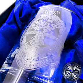 a close up macro shot of a military laser etched whisky tumbler presented inside a silk lined gift box