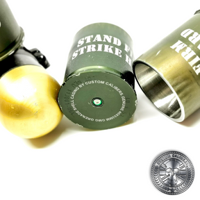 a close up of the famous 40mm GMG grenade shot glass showing the head stamp and primer