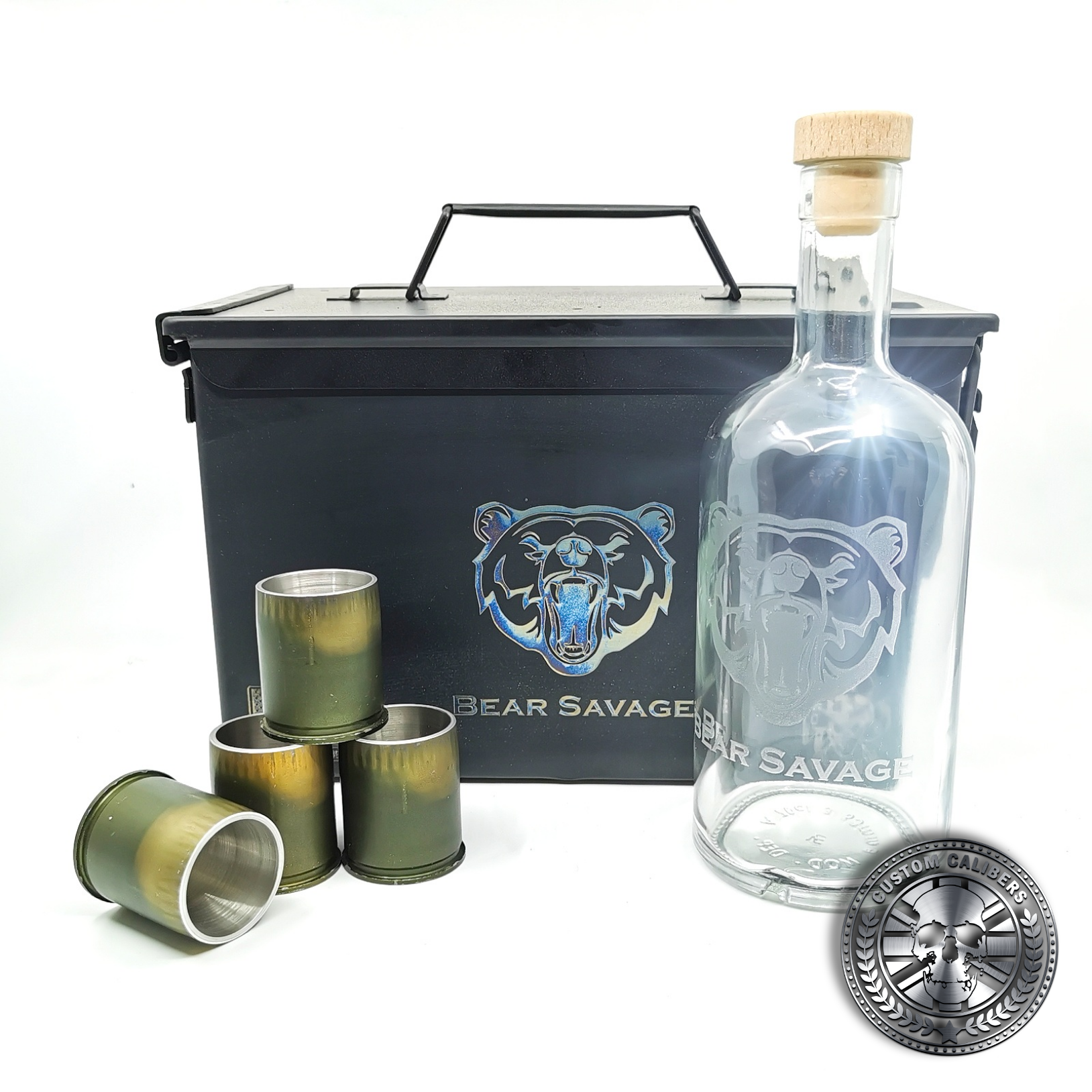 another shot of the MK19 GMG grenade gift set showing a whisky bottle and four grenade shot glasses